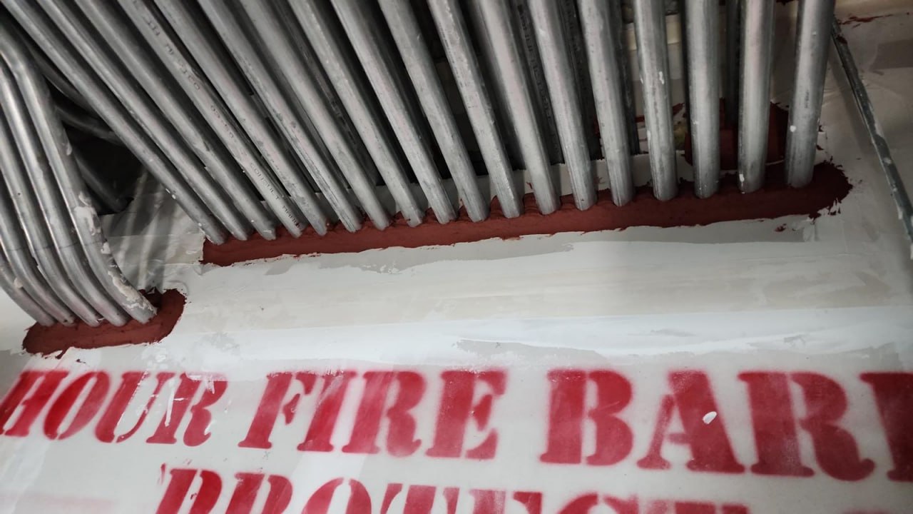 Fire barrier conduit bundle seal